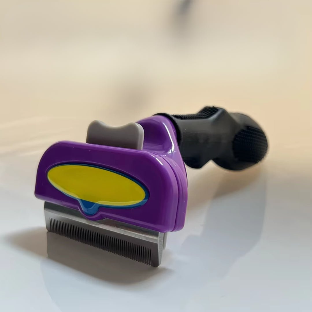 Cepillo deslanador tipo Furminator para gatos removedor de pelo autolimpiable