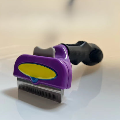 Cepillo deslanador tipo Furminator para gatos removedor de pelo autolimpiable